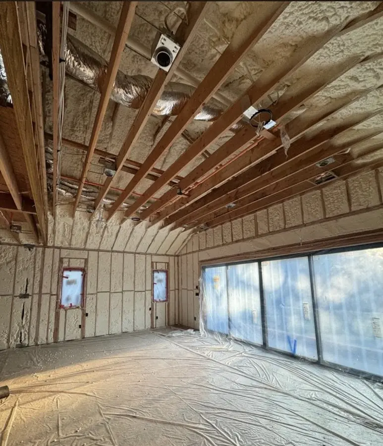 Interior walls and ceiling insulated with spray foam during new construction in Brandermill